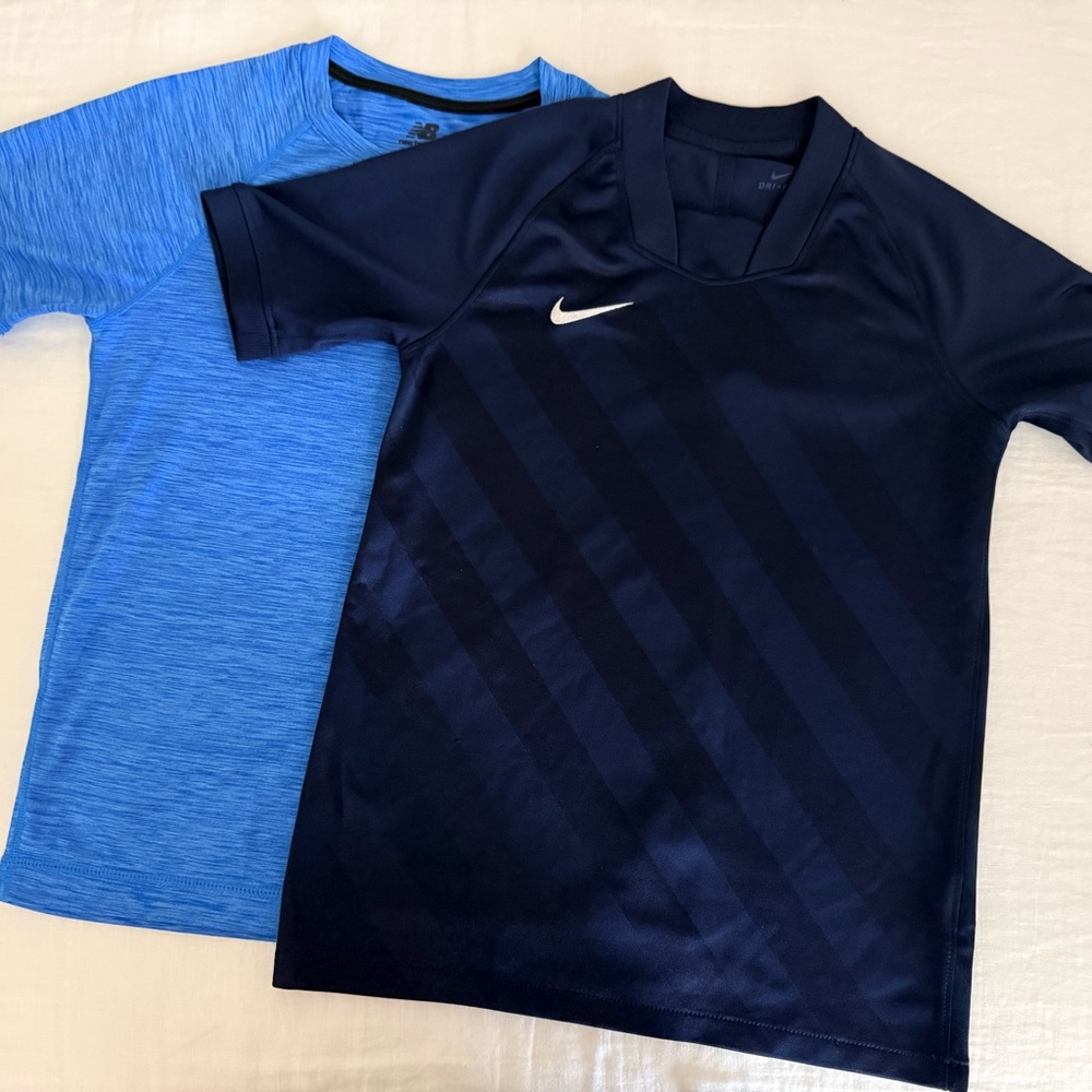 Bundle of Nike and New Balance Kids Blue and Navy Sports Shirts size M (10-12)